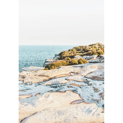 Sunlit Coastal Rocks